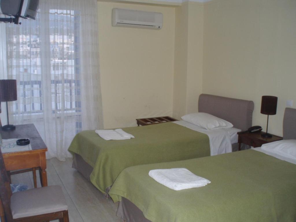 Delfinia Hotel Тинос Стая снимка