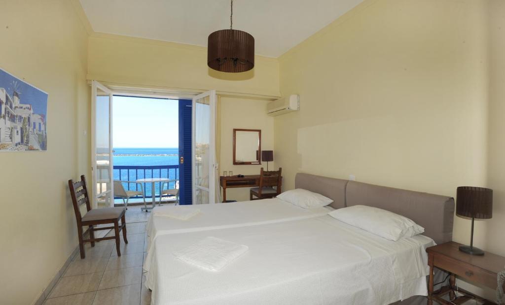 Delfinia Hotel Тинос Стая снимка